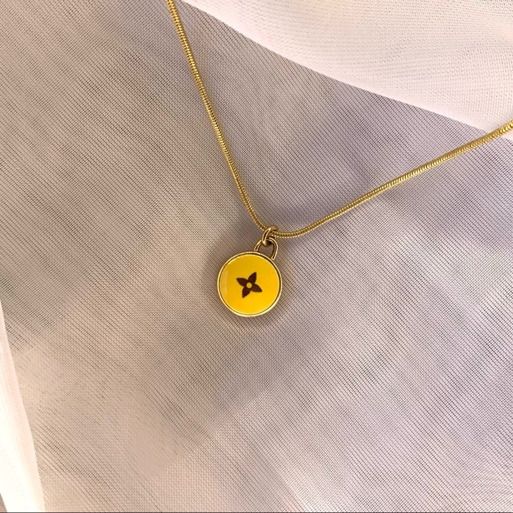 Louis Vuitton charm with necklace (authentic)